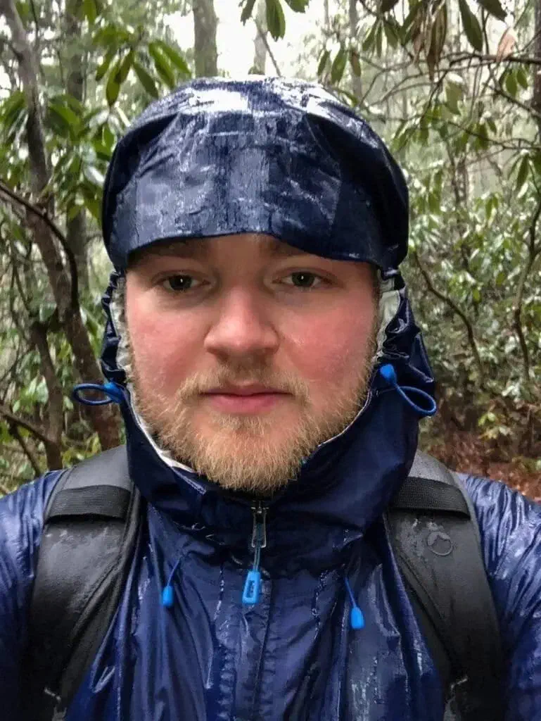 A shameless selfie I took at about mile 7 of a 17-mile hike. It had been pouring rain the entire time, but since I had the right gear, it was a pretty fun experience!