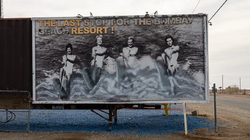 An old billboard for Bombay Beach, California