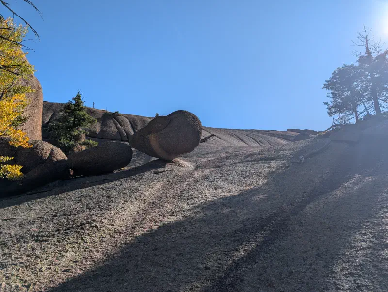 The final ascent up the granite on the way to Harmonica Arch - Pike National Forest, Colorado