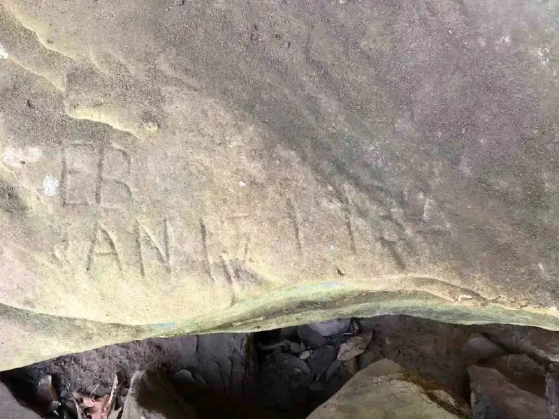 Old rock carving in Mammoth Cave National Park, Kentucky.